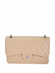 Cream beige caviar leather Jumbo Double Flap shoulder bag from Chanel Pre-Owned featuring diamond quilting, signature double flap closure, signature interlocking CC turn-lock fastening, concealed front press-stud fastening, two leather and chain-link shoulder straps, rear patch pocket, signature stitched interlocking CC logo, internal logo stamp, internal patch pockets, leather lining, silver-tone hardware and rectangle body. POSITIVELY CONSCIOUS: Purchasing this item continues its narrative and Luxury Double Flap Shoulder Bag, Luxury Beige Double Flap Bag, Luxury Beige Double Flap Shoulder Bag, Classic Beige Double Flap Bags, High-end Quilted Shoulder Bag For Formal Occasions, High-end Quilted Bags For Formal Occasions, Luxury Quilted Flap Bag, High-end Quilted Formal Bag, High-end Formal Quilted Bags