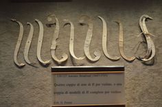 there are several pairs of scissors on display