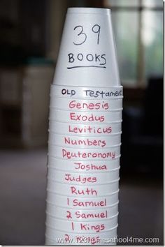 a stack of paper cups with the words 99 books written on them in different languages