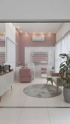 the interior of a nail salon with pink and white furniture, potted plants, and large mirrors