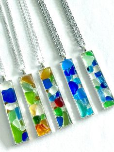 four pieces of sea glass on a chain