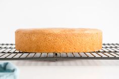 a cake sitting on top of a cooling rack