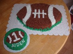 a cake shaped like a football on top of a table