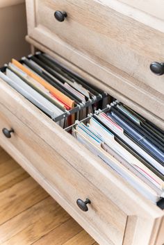 an open drawer with files and folders in it