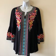 Beautiful Embroidered Black Top. Made Of 100% Rayon Black V-neck Blouse With Floral Embroidery, Black Embroidered Tops For Summer, Black Summer Tops With Intricate Embroidery, Black Tops With Intricate Embroidery For Summer, Black Top With Intricate Embroidery, Black Tops With Embroidered Hem For Fall, Black Fitted Bohemian Embroidered Top, Fitted Black Bohemian Embroidered Top, Fall Black Top With Floral Embroidery