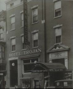 an old black and white photo of a hotel