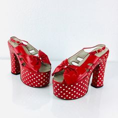 Vintage 1970s Red & White Polka Dot Platforms super tall platforms! ankle strap with buckle open toe with big bows cut outs at each side red patent leather over white for a polka dot effect by Gasuccio & Scalera made in Italy great vintage condition, very minor wear -  slight yellowing under to polka dots under heel appx size - 7.5 9.25 along insole 5.5 tall heel platform 2.5 at front platform 3 wide All sales are final Retro Party Heels With Red Sole, Vintage Red Heels For Party, Retro Red Sandals With Round Toe, Vintage Patent Leather Party Heels, Vintage Patent Leather Heels For Party, Retro Platform Sandals For Party, Retro Open Toe Heels With Buckle Closure, Vintage Party Heels With Red Sole, Retro Spring Heels With Red Sole