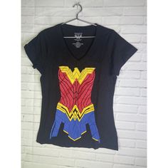 Up For Grabs Is A Brand New Without Tag Dc Comics Wonder Woman Graphic Print V-Neck Short Sleeve Tee T-Shirt Women's Juniors Size Large. Never Worn Or Used. Measurements Laying Flat Are Included In Photos, Please Compare Them To Your Own For Proper Fit! Please Refer To All Photos. Ask Any Questions Prior To Purchasing. Thanks! Black T-shirt With Graphic Print For Comic-con, Black Pop Culture T-shirt For Comic-con, Black T-shirt For Comic-con, Black Graphic Print T-shirt For Comic-con, Black Graphic T-shirt For Comic-con, Pop Culture Tops With Cartoon Print For Cosplay, Fandom Cartoon Print Tops For Cosplay, Cosplay Pop Culture Tops With Cartoon Print, Cosplay Pop Culture Top With Cartoon Print