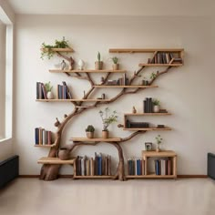 a bookshelf with many shelves and plants on it in the corner of a room