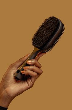 What it is: A double-sided Bristle Brush that polishes and refines strands.Who it's for: Ideal for curly, coily and tight hair textures.What it does: The 2-in-1 brush features nylon bristles to finesse flyaways and boar bristles to stick tighter styles. The lightweight brush gently polishes and refines strands. How to use: Use the brush on wet or dry hair to smooth hairstyles. Use as desired. 2.95" x 1.77" x 8.66" Premium boar bristles/nylon fibers/ABS/rubber Imported Smooth Hairstyles, Smoothing Brush, Curly Hair Brush, Best Hair Brush, Pattern Beauty, Black Hair Updo Hairstyles, Round Hair Brush, Scrub Corpo, Boar Bristle Brush