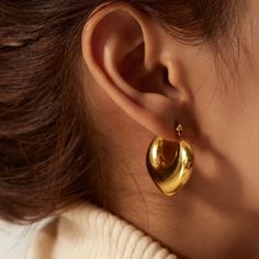 If you’re just embracing the chunky trend, this basic yet stylish pair is a safe place to start. From the timeless, these chubby gold-plated stainless steel hoops go with just about anything. Seen on and loved by many, these chunky earrings are best for the girl-on-the-go, taking you from coffee runs to the office to happy hour. - Metal: Stainless Steel. - Plating: 18K Gold Plated.- Long: Aprox. 2.5 cm.- Closure: Hoop.- Width: 3 cm. Ships in a Balara Gift Pouch. Available in Gold.SKU #EC107 Luxury Timeless Gold Hoop Earrings, Luxury Gold-plated Pierced Hoop Earrings, Luxury Gold Plated Pierced Hoop Earrings, Cheap Gold Plated Statement Earrings, Luxury Handmade Gold Hoop Earrings, Luxury Gold Plated Timeless Earrings, Luxury Timeless Gold Plated Earrings, Luxury Timeless Earrings For Gift, Gold Chunky Flat Band Hoop Earrings