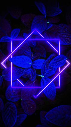 purple neon lights in the shape of a hexagon surrounded by leaves