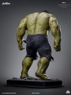 the incredible hulk statue is displayed on a black base with white lettering that reads,