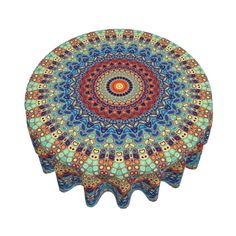 an artistically designed round table with blue, red and orange colors