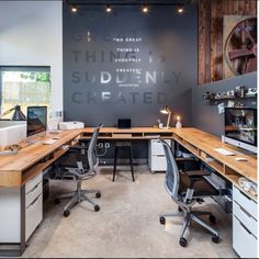 an office with two desks and chairs in front of a wall that says, this is sudenny created