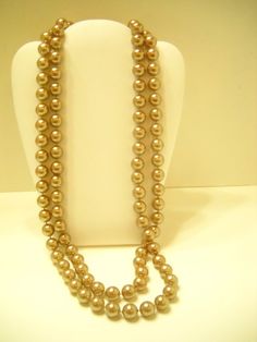 Vintage 11mm gold tone beaded necklace. 54" long. This is gorgeous!!! Excellent condition. Unsigned. Elegant Long Necklace With 8mm Beads, Classic Gold Beaded Necklaces For Formal Occasions, Classic Gold Beaded Necklace For Formal Occasions, Elegant Gold Necklaces With 8mm Beads, Elegant Gold Beaded Necklace With Large Beads, Vintage Gold Jewelry With 8mm Beads, Formal Gold Necklaces With 8mm Beads, Elegant Long Necklace With Large Beads, Gold Single Strand Beaded Necklace For Costume Jewelry