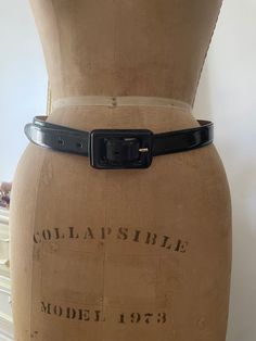 To view the full description for this vintage item, please expand the listing 🌸 Vintage Brooks Brothers dress belt, made in Italy of a high quality glossy black leather (not patent leather, just a high shine.  Size marked M Smallest setting 28" Largest: 32" Total length not including buckle: 36" Excellent vintage condition with barely any signs of wear, presents beautifully! ♥️ All sales on preowned vintage are final, no returns or order cancellations. Feel free to reach out with any questions prior to purchase- happy to help! Vintage Belt Buckles For Party, Vintage Belt Buckles With Removable Belt For Parties, Vintage Fitted Belt For Formal Occasions, Fitted Vintage Style Belt For Formal Wear, Vintage Fitted Belt For Formal Wear, Formal Fitted Black Belt Buckle, Vintage Formal Fitted Belt, Vintage Belts With Removable Buckle For Parties, Designer Fitted Black Belt