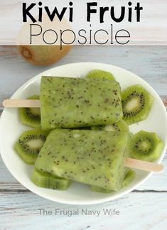 kiwi fruit popsicle on a white plate