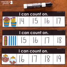 three printable numbers and counting cards on a wooden table