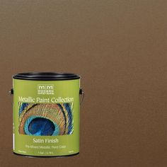 a can of metallic paint with a peacock feather on the side and brown wall behind it