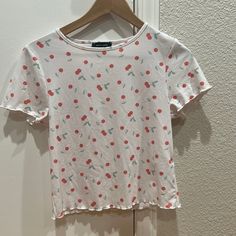 White Cropped Baby Tee With Cherry Print. Excellent Condition, Never Worn. Sweet White Tops With Strawberry Print, Trendy Spring Tops With Strawberry Print, Casual Patterned Spring T-shirt, Cute Patterned Cotton Tops, Cute Cotton Tops With Pattern, Cute Cotton Patterned Tops, Playful Patterned Top With Graphic Print, Fitted Casual Tops With Cherry Print, Fitted Casual Cherry Print Tops