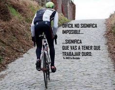 a bicyclist riding down a cobblestone road with the words, all weekend you amaze yourself with the challenges you overcome