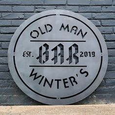 a sign on the side of a building that says old man winter's