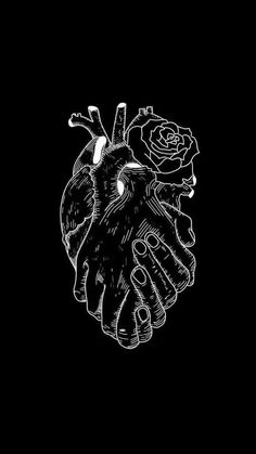 a black and white drawing of a hand holding a heart with a rose on it