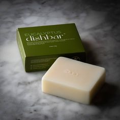 DISHBAR™ in Eucalyptus (6.2oz) Handmade in Upstate New York About our soap: Our natural and effective unique formula DISHBAR™ suds up beautifully and will clean your dishes and glassware better than most traditional liquid soaps. The bar is multi-use and can also be rubbed on stains, making a safe and effective natural stain remover or ground up and used as washing detergent. This bar has only 7 natural ingredients and will not dry out or irritate your skin. Why switch to solid dish soap? Solid Solid Dish Soap, Natural Stain Remover, Washing Detergent, Liquid Dish Soap, Zero Waste Kitchen, Dishwasher Soap, Bread Bowls, No Waste, More Water