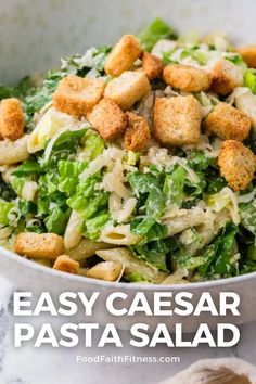 this easy caesar pasta salad is loaded with chicken, lettuce and croutons