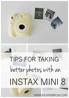 an instax mini 8 camera sitting on top of a table next to photos