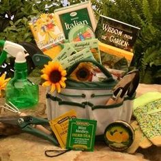 a basket filled with gardening supplies sitting on top of a rock