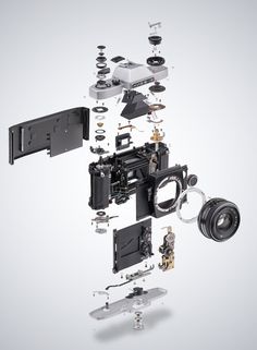 an image of a camera being assembled into parts