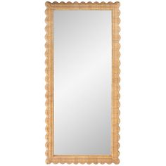 a large mirror with scalloped edges and a gold frame on the bottom half