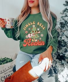 Jingle Bell Rockin Sweatshirt - Christmas Tree Sweater - Music Lover Christmas Shirt - Christmas Music Hoodie - Funny Christmas Shirt How can I order? 1️) Please review all the information provided before placing an order 2️) Select the shirt type and size. 3️) Select the color of the shirt using the following options. 4️) Please add the vinyl color (white or black) in the optional message section of the order. 5️) Need more Items? Add the current item in the cart. And If you like to add more items to your order please press the back button and repeat steps 1-4 again. 6️) Once all your desired items are in your cart you may complete your order by entering your payment method, desired shipping address and click submit. When will my product arrive? Processing Time: 1-3 days During holidays p Casual Green Christmas Sweatshirt, Casual Christmas Cotton Sweatshirt, Casual Cotton Christmas Sweatshirt, Casual Christmas Cotton Hoodie, Casual Cotton Christmas Hoodie, Casual Christmas Hoodie With Crew Neck, Christmas Tree Sweater, Gigi Shirts, Tree Sweater