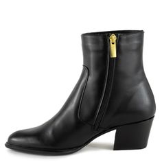 Our Asinara boot has been a key part of our A/W collections for many, many years and after a brief break they are back by incredibly popular demand. This enduringly chic ankle boot is skilfully hand made in Spain and comes in 4 easy to wear and luxurious colour/material combinations. Sitting atop a versatile, mid height, cuban heel, Asinara has a soft almond toe and finishes just above the ankle. The cut is slim on the ankle so they pair beautifully with trousers and dresses alike. A side zip with elegant gold hardware allows for easy access. Uppers - 100% Leather Lining - 100% Leather Sole - Rubber  Protect and nourish the leather with a neutral polish and a soft cloth. Wipe dirt off with a damp cloth. Neutral Polish, Bespoke Shoes, Cuban Heels, Brand Magazine, Blazer With Jeans, And Dresses, Stylish Shoes, Independent Designers Fashion, Black Ankle Boots