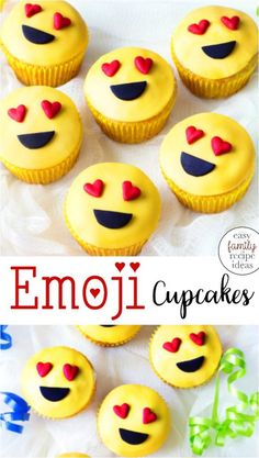 cupcakes with yellow frosting and red hearts on them are arranged in the shape of emoji