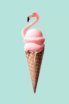 an ice cream cone with a pink flamingo on top