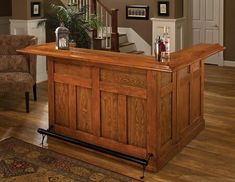 a wooden bar in the middle of a living room