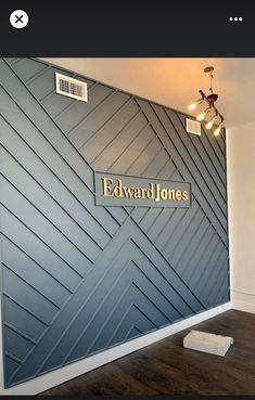 the entrance to edward jones's office is painted blue with gold lettering on it