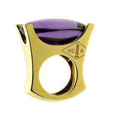 A fabulous Van Cleef and Arpels cocktail ring featuring a vivid amethyst encased by 4 of the finest Van Cleef and Arpels round brilliant cut diamonds in 18k yellow gold. Weight : 45.8 grams Gold Vans, Yellow Gold Cocktail Ring, Design Houses, Van Cleef & Arpels, Diamond Rings With Price, White Gold Bangle, Gold Flower Ring, Smoky Quartz Ring, Van Cleef And Arpels