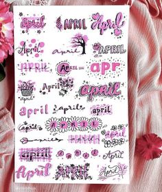 a pink and white poster with words on it next to some flowery petals in front of a pink background