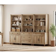 a large wooden bookcase with drawers and shelves in the middle of a living room