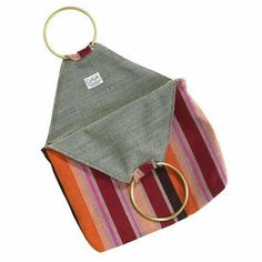 an orange, red and pink striped bag with a gold ring hanging from the handle