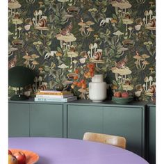 the wallpaper is very colorful and has animals on it