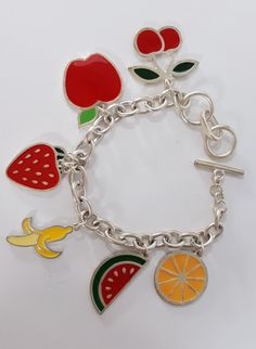 Handmade Bracelet Fruit Mix Charm Bracelet Womens Girls Boho Rainbow Colorful Enamel Charm Silver Tone Arty Modern Design Huge Toggle CLASP Everyone LOVES these handmade bracelets... FABULOUS Colorful fun happy festive pop art easy to wear and very durable. Fun JUMBO FRUIT charm, bracelet is 7 1/2 to 9 inches long total and has a jumbo sized toggle clasp THAT MAKES IT EASY FOR YOU TO GET OFF AND ON YOURSELF Great for Women and Girls. Bracelet is stainless steel hypoallegenic all safe metals. Exc Trendy Multicolor Charm Bracelet With Lobster Clasp, Playful Handmade Silver Charm Bracelet, Nickel-free Multicolor Novelty Jewelry, Playful Handmade Silver Bracelets, Nickel Free Multicolor Metal Bracelets, Trendy Multicolor Nickel Free Charm Bracelet, Multicolor Nickel Free Metal Bracelets, Trendy Multicolor Nickel-free Charm Bracelet, Novelty Multicolor Metal Jewelry