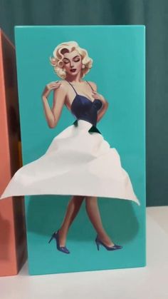 a card with a painting of a woman in a white dress and blue high heels