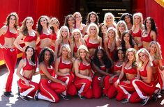 the cheerleaders are posing for a group photo