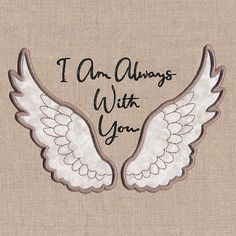 i am always with you angel wings embroidered on burlocked linen fabric by the yard