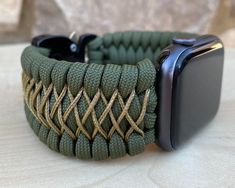 "FREE USPS PRIORITY MAIL SHIPPING FOR DOMESTIC US ORDERS (Includes U.S. Military APO/FPO Address Overseas) Thank you for visiting our shop \"Cording 2U\". A veteran owned business. Handcrafted Paracord wearables customized \"According To You\". Handcrafted with 100% Nylon Paracord \"MADE IN USA\" Our Products include: 🔹Custom handcrafted watch bands according to your wrist size, style, and color of choice. If you don't see it in our page yet, please contact us and we can discuss your options. ? Adjustable Durable Green Watch Bands, Handmade Adjustable Green Watch Bands, Custom Handmade Adjustable Apple Watch Band, Adjustable Green Apple Watch Band For Everyday Use, Adjustable Green Apple Watch Band, Green Adjustable Customizable Watch Bands, Adjustable Customizable Green Watch Bands, Paracord Watch, Handmade Watch Bands